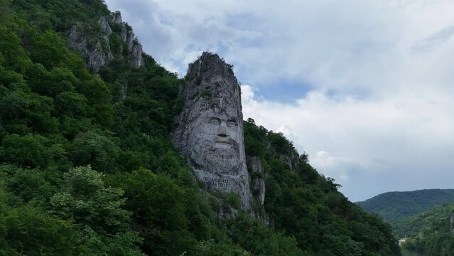 The rock sculpture of Decebalus, a colossal carving of the face of Decebalus, the last king of Dacia.
Decebalus Rex, Dragan Facit
