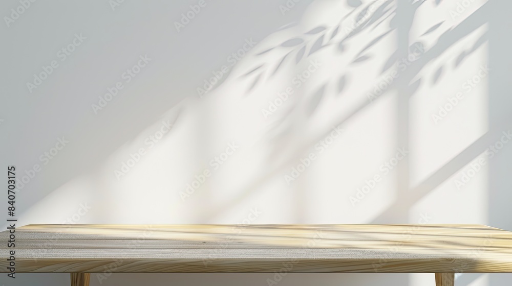 Wall mural Empty Light Wood Table with Soft Shadow and Sun Rays on White Wall Background - Wall murals