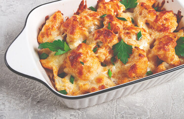 baked cauliflower, in cream sauce, with cheese and spices, homemade, no people,