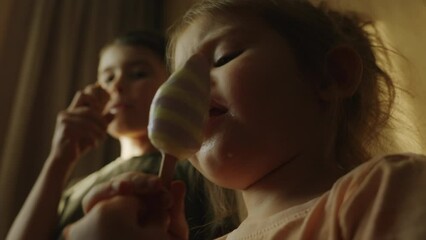 A video of a girl and a boy enjoying ice cream and ending happily together