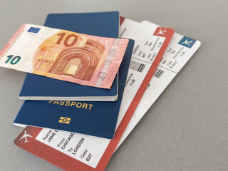 Euro, Passport and air tickets on a black background. mockup empty blank, copy space.