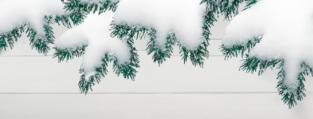 Christmas garland lights, holiday festive winter art design. Widescreen backdrop. Snowy scene.