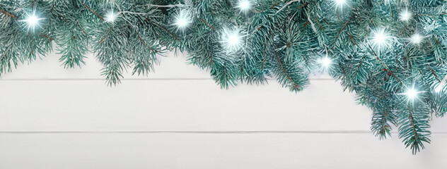 Christmas garland lights, holiday festive winter art design. Widescreen backdrop. Snowy scene.