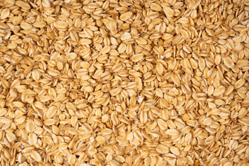 Oat-flakes as a background. Top view.