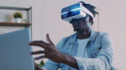 Man immersed in virtual reality, wearing a headset and interacting with a laptop, in a minimalistic, well-lit room.