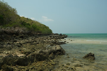 rocky coast of Koh Larn island, Thailand