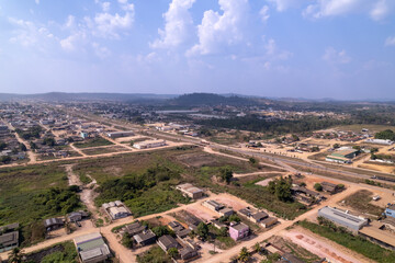 Aerial drone view of Novo Progresso city skyline, dirty streets, squares and BR-163 road. Amazon...