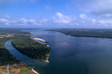Beautiful aerial view of Xingu River near Belo Monte hydro power plant lake in Amazon rainforest in Altamira city, Para, Brazil. Concept of environment, ecology, nature, energy, electricity.	