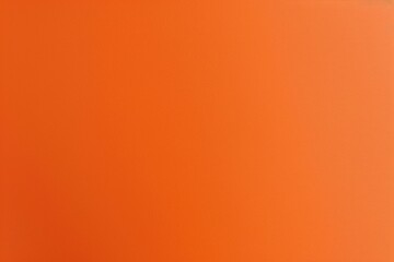 Vibrant orange background for text or graphics, with a smooth surface and uniform color