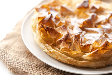 Sweet pie, homemade pastries on a light background. Selected focus. Close-up.