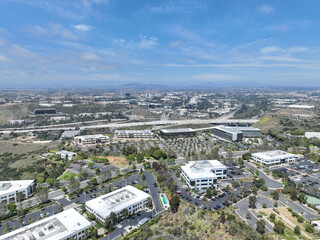 Aerial view of business park with mixed use facility service building and offices in South San...