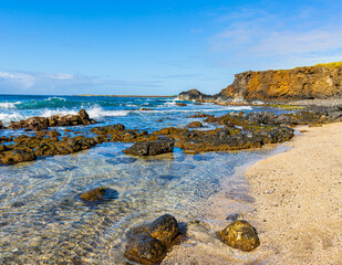 Tide Pools and Exposed Lava Reef Below Sea Cliffs on Glass Beach, Port Allen, Kauai, Hawaii, USA