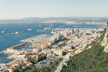 Naklejka premium Views of the city of Gibraltar from the top of the Rock's nature reserve. Aerial view of the Strait of Gibraltar.