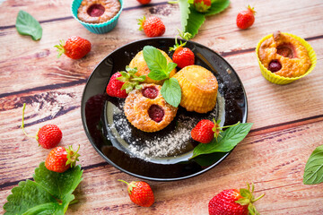 Sweet curd muffins with strawberry filling