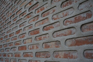 Seamless brick layers pattern wall background, Red uneven break texture backdrop, Artistic 3d layered brick pattern surface