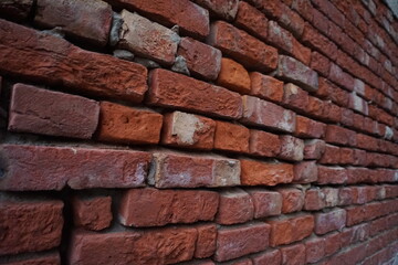 Abandoned rustic brick layered wall surface, Grungy red brick wall texture background, Old rustic colored wall backdrop