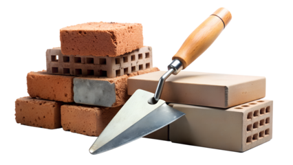 a stack of six bricks with a trowel resting on top. There are three red bricks with holes in the center, arranged in a pyramid shape, and three solid beige bricks placed horizontally beneath them