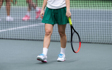 Woman playing tennis on blue floor. Horizontal sport poster, greeting cards, headers, website