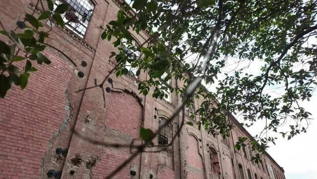 slow motion of large abandoned factory
