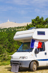 Caravan in mountains. Mont Ventoux in the distance. Provance