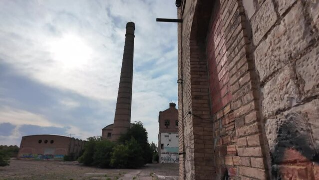 slow motion of large abandoned factory
