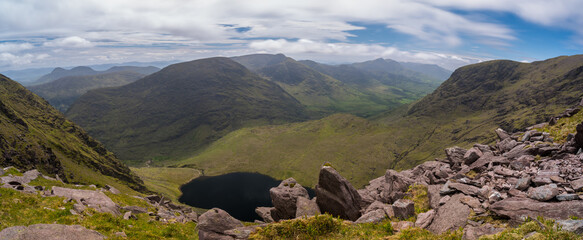 Panoramic view of Curraghmore Lake from Devils Ladder, one of most difficult trails, that is...