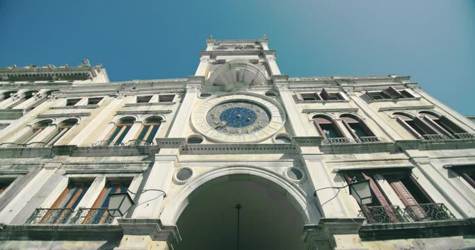 St Mark's Clock Tower Venice Italy. Architecture of Saint Mark's Square with historical buildings in the center of the touristic city of Europe. High quality 4k footage