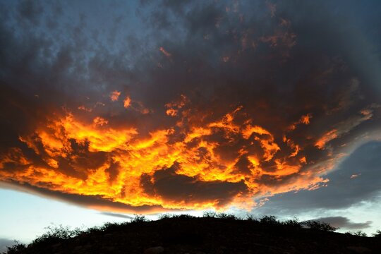 Burning clouds at sunset, near Chos Malal, Neuquen province, Patagonia, Argentina, South America