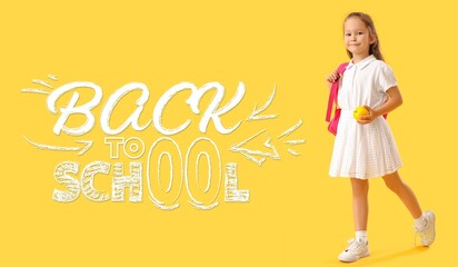 Little girl with apple on  yellow background. Back to school