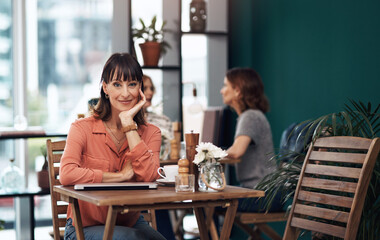 Portrait, smile and woman in cafe with idea for business, career and coffee in city. Laptop, online and blogger in restaurant with tea, email and remote work with break and relax from internet