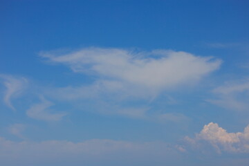 White clouds against the blue sky