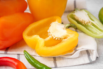 Different fresh peppers on white background