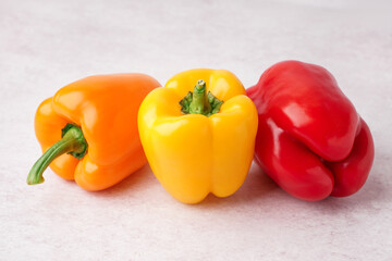 Fresh bell peppers on white background