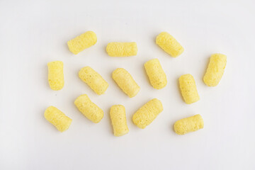 Tasty corn sticks on white background