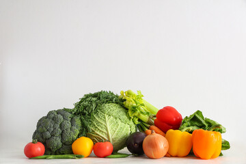 Different fresh vegetables on white background