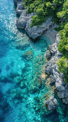 Create an aerial view image of a tranquil ocean shore where the clear turquoise waters created with Generative AI technology