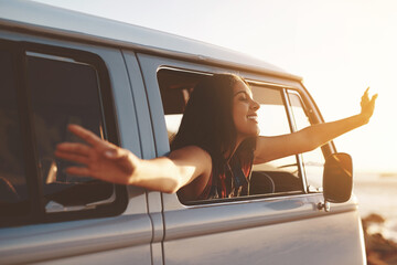 Road trip, woman and freedom in car with smile, van and travel for holiday and vacation. Transport,...