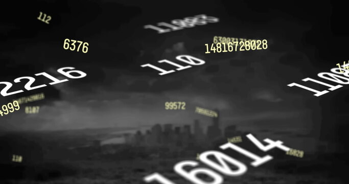 Image of falling numbers over cityscape