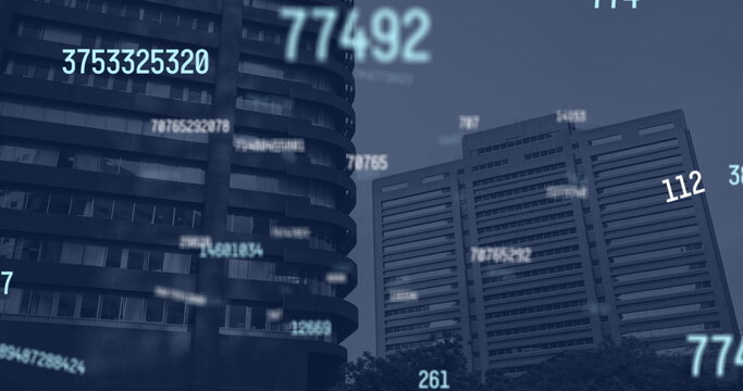 Image of falling numbers over cityscape
