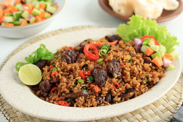 Nasi Goreng Kambing, Spicy Fried Rice with Goat Meat for Ied al Adha Menu.