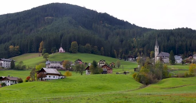Panoramic view of Church and homes in scenic Gosau village in Austria.