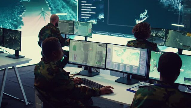 Army officer establishing new operating bases through a world map satellite vision, ensure the connectivity to the power base command center. Commander operates CCTV radar footage. Camera B.