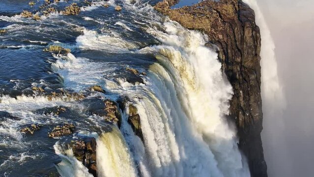 Victoria Falls At Livingstone In Northern Rhodesia Zambia. Giant Waterfalls. Nature Landscape. Livingstone At Northern Rhodesia Zambia. Zambezi River. Travel Scenery.