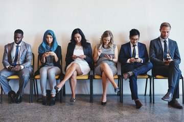 Employee, business people and waiting room for recruitment, interview or hr opportunity. Group, candidates or row in office for hiring, human resources and corporate job search on technology together