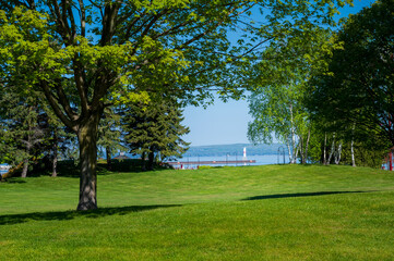 Scenic Petoskey Park with Marina Light, Waterfront View and Copy-Space