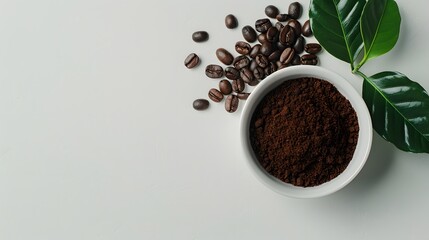 Bowl of ground coffee and beans isolated on white background