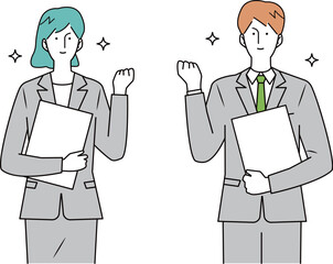 ガッツポーズをするスーツ姿の男女