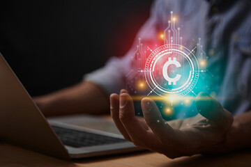 Red Turquoise Cryptocurrency or Coin Symbol Concept. Cryptocurrency Exchange Icon or Coin Symbol with Businessman's Hand and Laptop Computer
