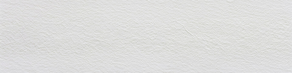 An abstract texture pattern of paper or plaster in soft white. 