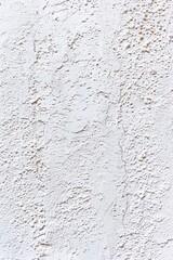 Obraz premium An abstract texture pattern of paper or plaster in soft white. 